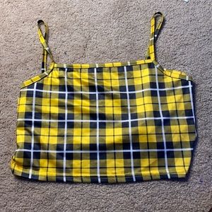 Small plaid top with navy, yellow and white colors